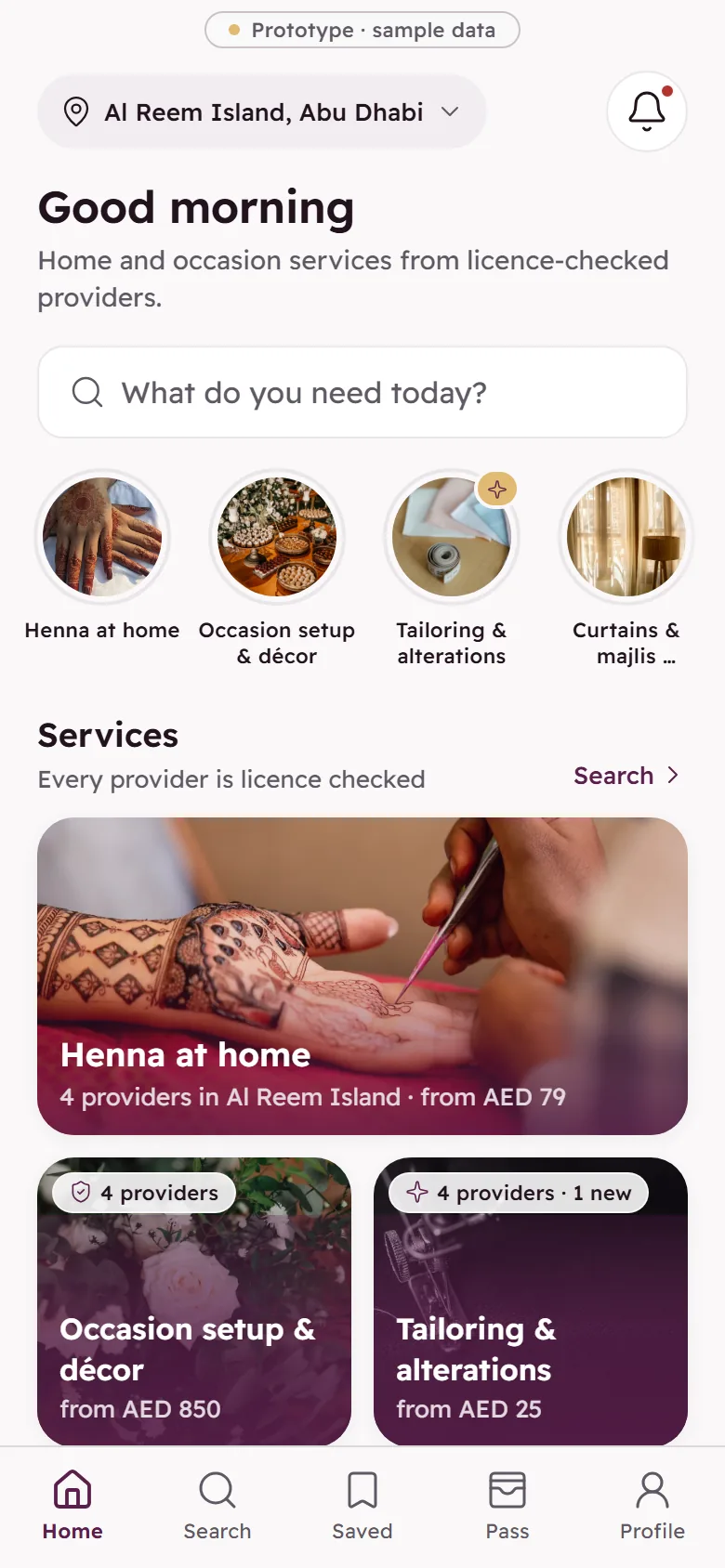 The Rawnaq app home screen in English: location, greeting and service categories.